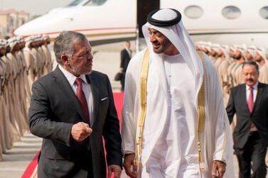 Sheikh Mohamed walks with King Abdullah II. Courtesy: Ministry of Presidential Affairs