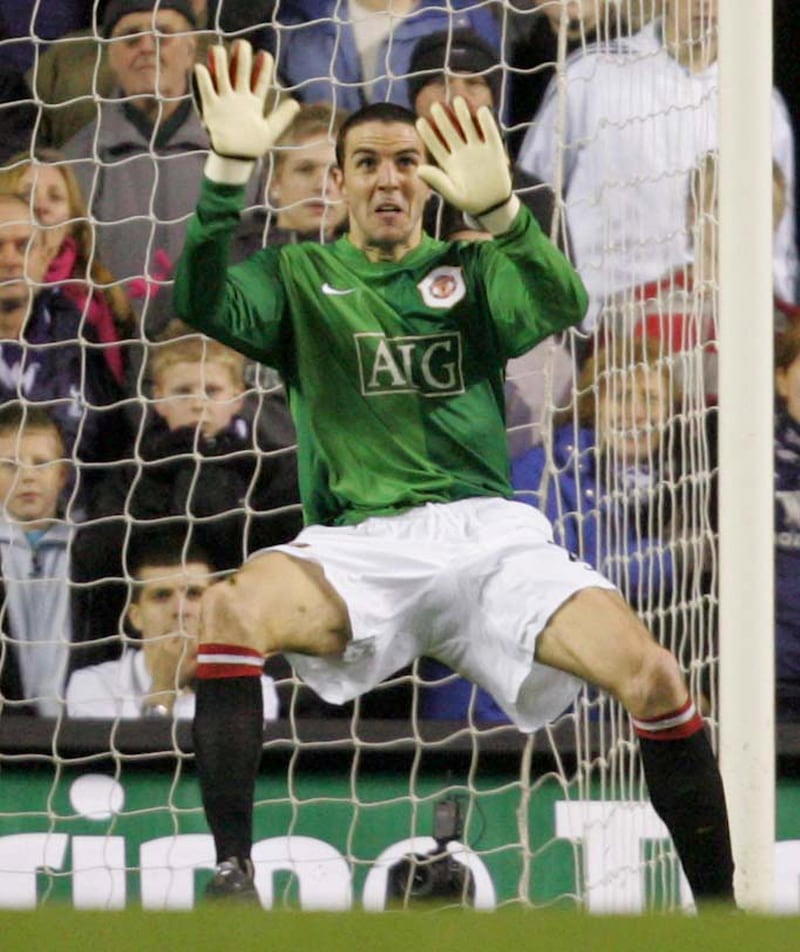 LONDON, ENGLAND - FEBRUARY 4: John O'Shea of Manchester United in action in goal in place of the injured Edwin van der Sar during the Barclays Premiership match between Tottenham Hotspur and Manchester United at White Hart Lane on February 4 2007 in London, England. (Photo by Matthew Peters/Manchester United via Getty Images)
