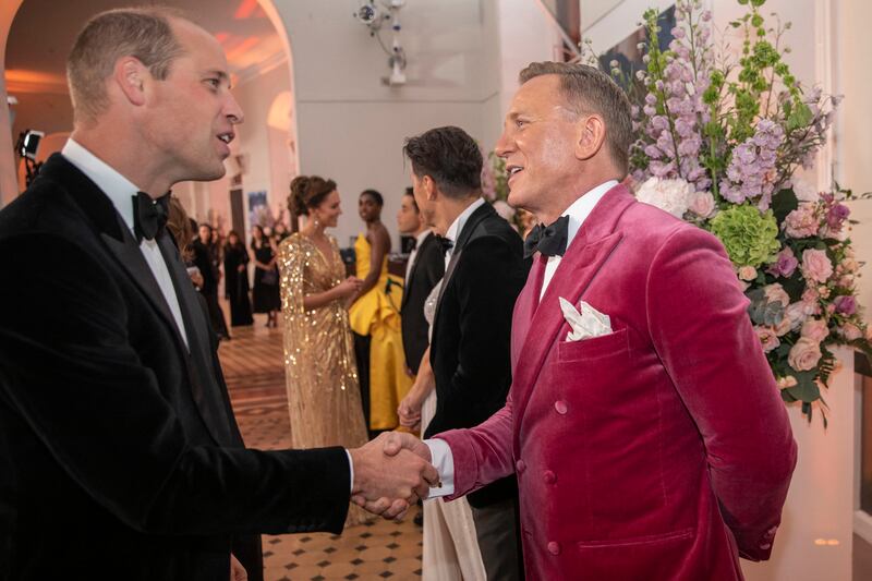 Prince William meets actor Daniel Craig ahead of the world premiere of the James Bond film 'No Time to Die' at the Royal Albert Hall in west London on September 28, 2021. AFP