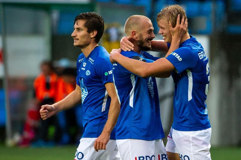 Mandatory Credit: Photo by Svein Ove Ekornesvaag/EPA-EFE/Shutterstock (9792263c)
Molde's Erling Braut Haaland (right) celebrates after scoring a goal during the  UEFA Europa League qualification match between Molde FK and Hibernian Edinburgh at Aker stadium in Molde, Norway, 16 August 2018.
Molde FK vs Hibernian Edinburgh, Norway - 16 Aug 2018