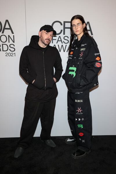 Balenciaga creative director Demna Gvasalia, now known simply as Demna, with artist Eliza Douglas at the 2021 CFDA Fashion Awards, in New York. Getty Images
