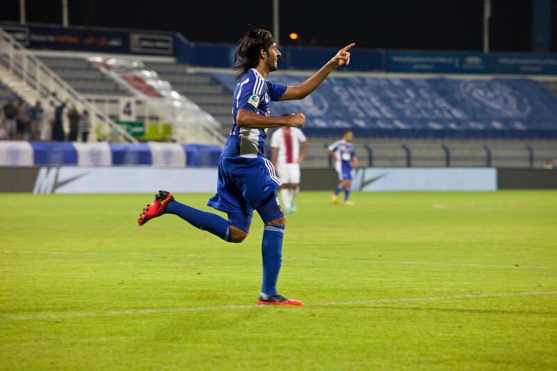 Dubai, United Arab Emirates - November 18 2012 - Jamal Ibrahim Hussain celebrates after scoring goal for Al Nasr. Al Nasr beat Al Wahda 4-1 at Al Nasr Stadium on Sunday night. (Razan Alzayani / The National) 