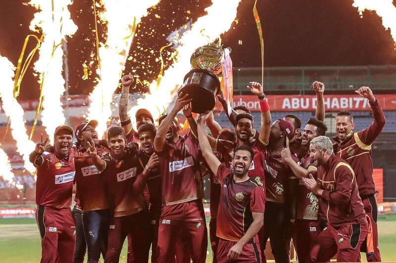 Northern Warriors players celebrate with the trophy after winning the Abu Dhabi T10. Courtesy Abu Dhabi T10