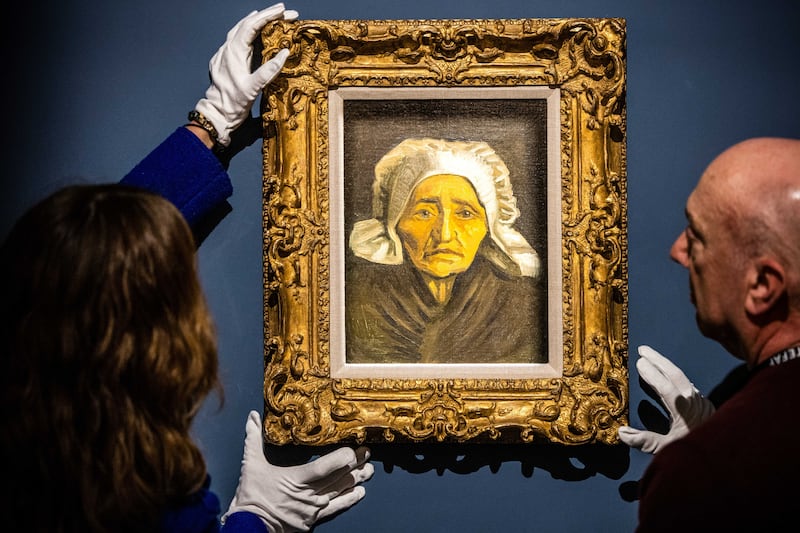 Vincent van Gogh's Head of a Peasant Woman in a White Headdress is hung at TEFAF in Maastricht. EPA