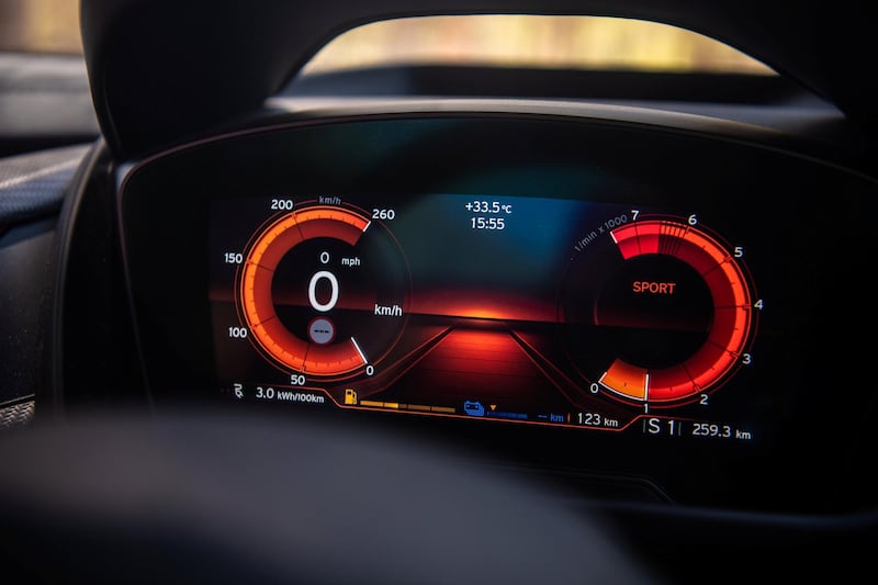 The virtual instrument cluster turns red when you shift into sport mode. BMW