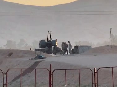 Military personnel stand guard at a nuclear facility in the Zardanjan area of Isfahan, Iran, April 19, 2024, in this screengrab taken from video.   WANA (West Asia News Agency) via REUTERS   ATTENTION EDITORS - THIS PICTURE WAS PROVIDED BY A THIRD PARTY.  IRAN OUT.  NO COMMERCIAL OR EDITORIAL SALES IN IRAN