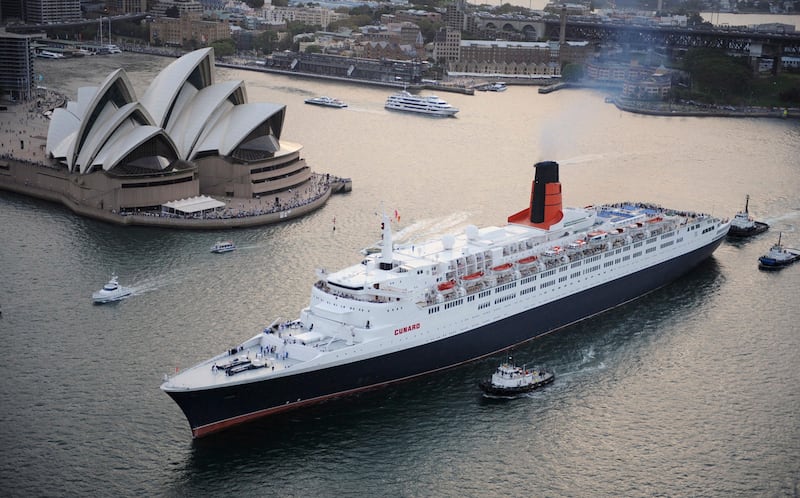 In this photo released by Cunard shows ocean liner the Queen Elizabeth 2 as it sails from Sydney Harbour Monday, Feb. 25, 2008. The legendary 70,327-ton liner departed Sydney for the final time as it continues on its final world voyage, a 103-night odyssey around the globe before becoming a first-class tourist destination in Dubai later this year. (AP Photo/Cunard, James Morgan,HO) **EDITORIAL USE ONLY, NO COMMERCIAL SALES**