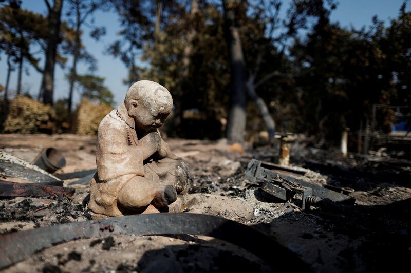 A burnt statue at the Les Flots Bleus camping site, which was destroyed by the fire that ravaged La Teste-de-Buch forest in France's Gironde region. Reuters