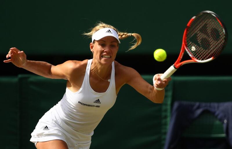 Angelique Kerber of Germany plays a forehand during the Ladies Singles Semi Final match against Venus Williams of The United States on day ten of the Wimbledon Lawn Tennis Championships at the All England Lawn Tennis and Croquet Club on July 7, 2016 in London, England.  (Photo by Clive Brunskill/Getty Images)