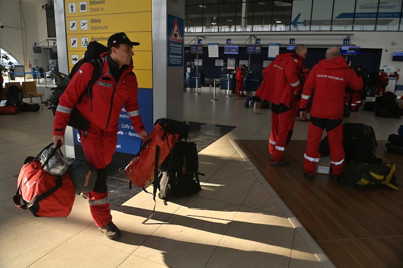 Czech urban search and rescue firefighters at Leos Janacek Airport in Czech Republic. AP