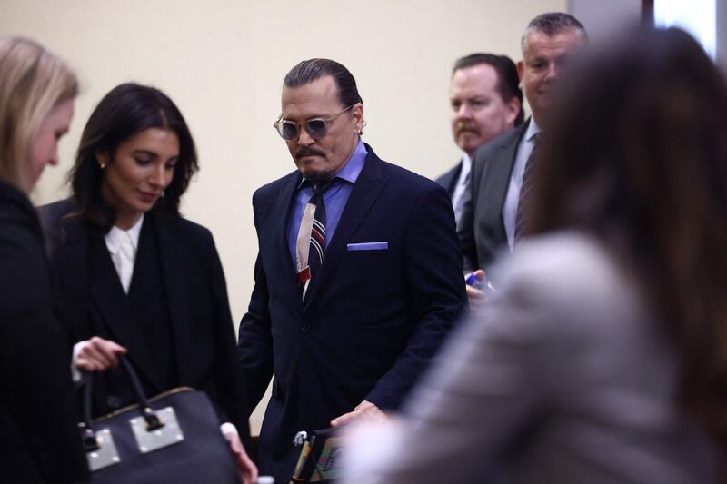 Depp arrives at the Fairfax County Circuit Courthouse. AFP