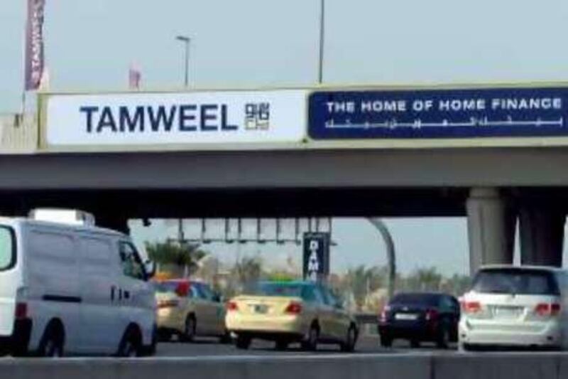 Dubai, 18th August 2008.  Tamweel ad, down 3rd interchange in Sheikh Zayed road.  (Jeffrey E. Biteng / The National) *** Local Caption ***  JB0755-Tamweel.jpg JB0755-Tamweel4.jpg