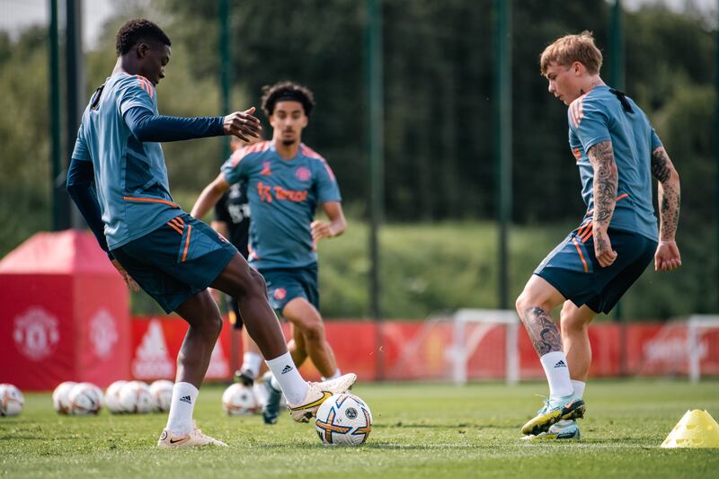 Kobbie Mainoo and Isak Hansen-Aaroen during Manchester United's training session. Getty