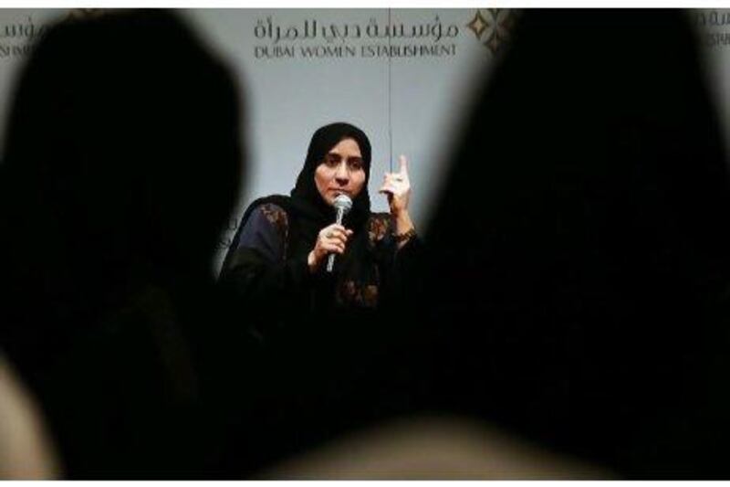 Don't discuss issues, represent women's views: Rowaya Al Samahi, a former FNC member for Fujairah, addresses the Women's Participation in the FNC seminar in Dubai yesterday. Delores Johnson / The National