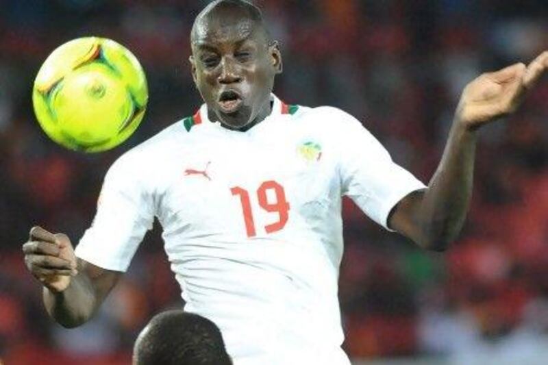 Senegal and Demba Ba, above, need to overcome the 4-2 first-leg loss to the Ivory Coast. Abdelhak Senna / AFP