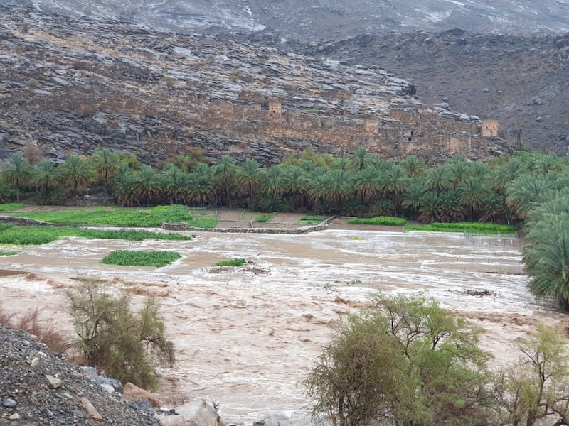 Rain that lashed mountain villages flooded the valley below and flowed into Wadi Gul Dam in Al Dakhiliyah province. Photo: Oman News Agency