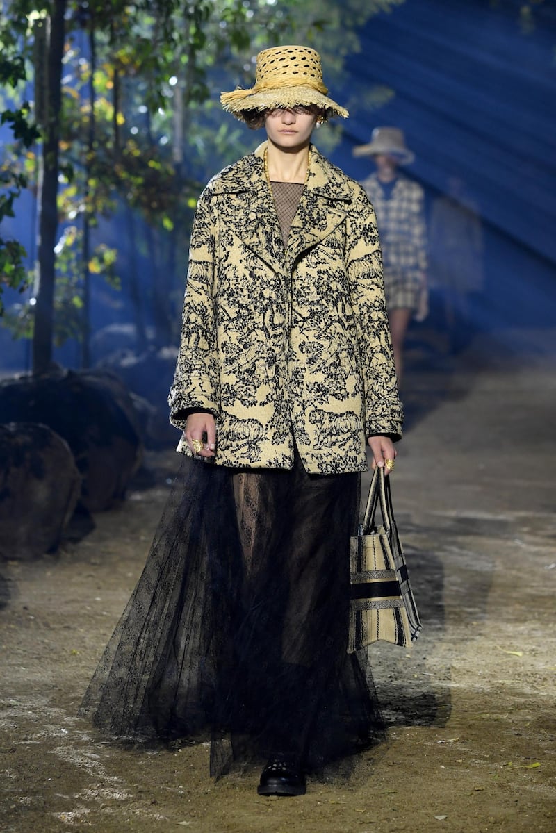 A loose toile patterned&nbsp;jacket over a floor length netting skirt at&nbsp;Christian Dior Womenswear Spring/Summer 2020.Getty Images
