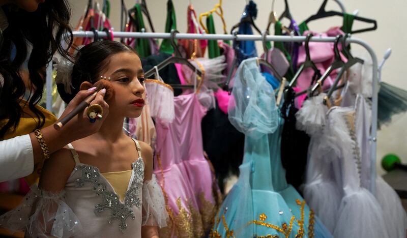 A Baghdad Ballet Academy student prepares before performing in The Sleeping Beauty at Al Rashid National Theatre in the Iraqi capital. Reuters