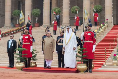 Sheikh Mohammed bin Zayed and Indian president Pranab Mukherjee stand for the national anthem during a reception at Rashtrapati Bhavan. Mohamed Al Suwaidi / Crown Prince Court