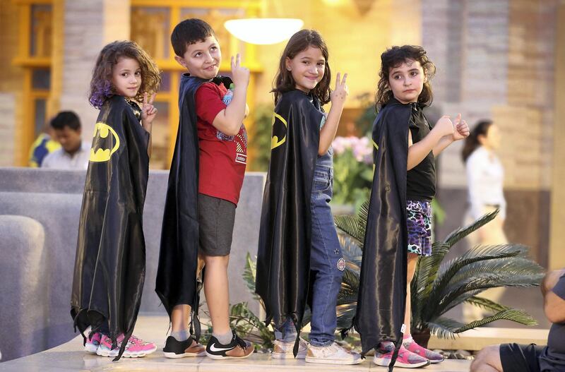 ABU DHABI ,  UNITED ARAB EMIRATES , SEPTEMBER 21 – 2019 :- Kids wearing capes and taking part in the Guinness World Record for the Batman’s 80th anniversary held at Warner Bros  in Abu Dhabi. ( Pawan Singh / The National ) For News/Online/Instagram
