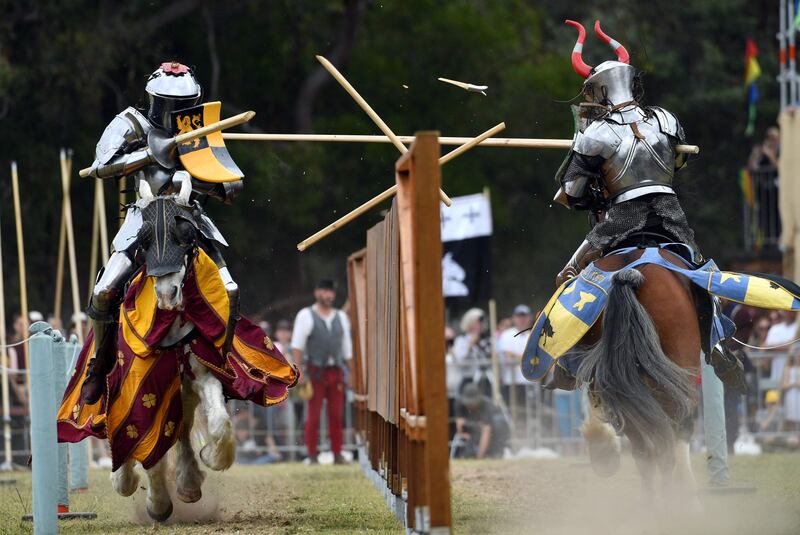 Per Estein Prois-Rohjell of Norway and Britain's Dominic Sewell, left, compete in the inaugural World Jousting Championship at the St Ives Medieval Faire in Sydney. Saeed Khan / AFP