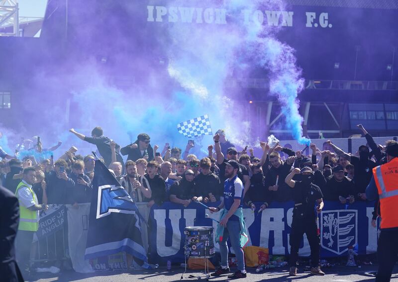 Ipswich Town fans before the game. PA 