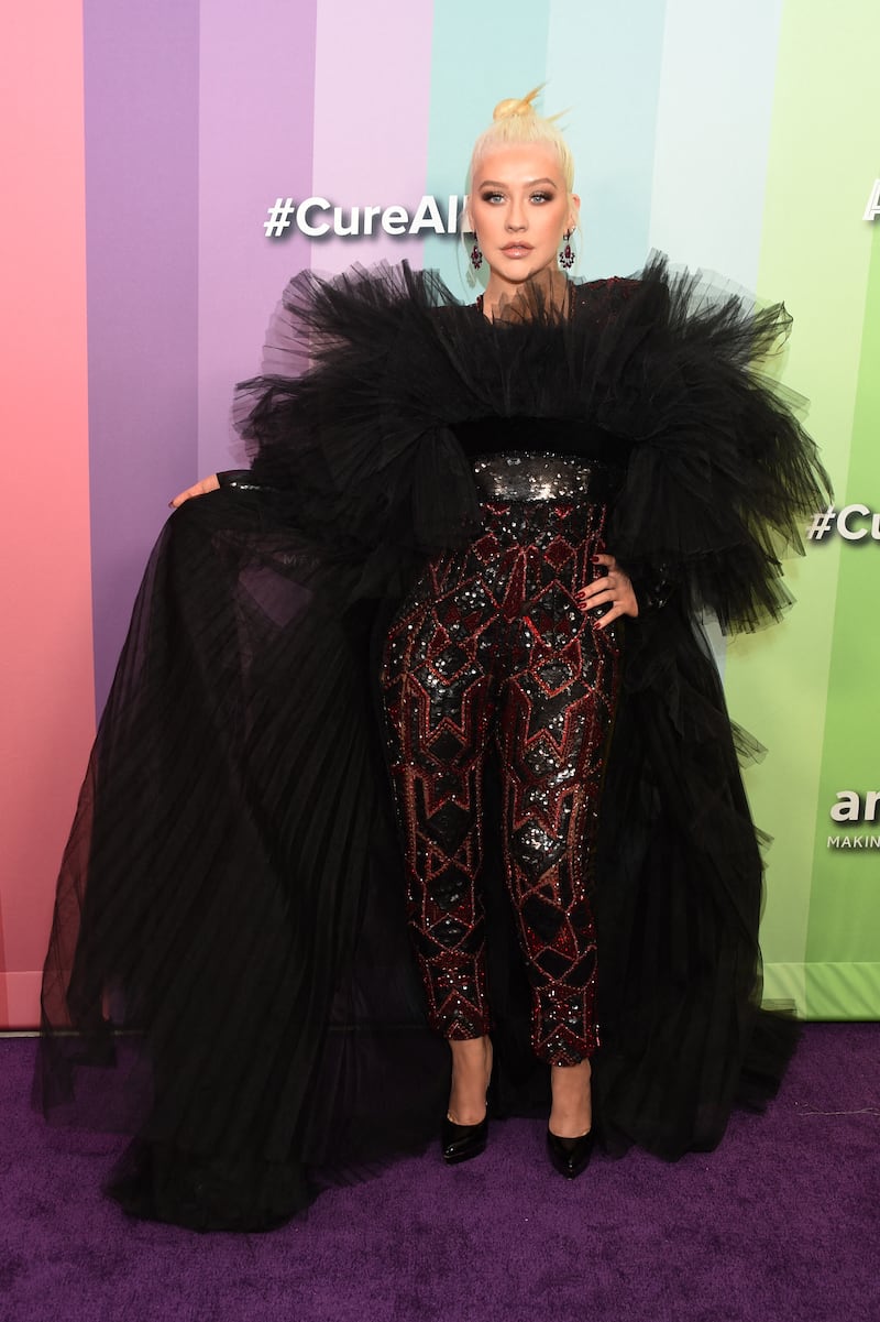 Christina Aguilera, wearing a black tulle and sequinned Nicolas Jebran look, attends the 2019 amfAR Gala Los Angeles on October 10, 2019 in Los Angeles, California. AFP