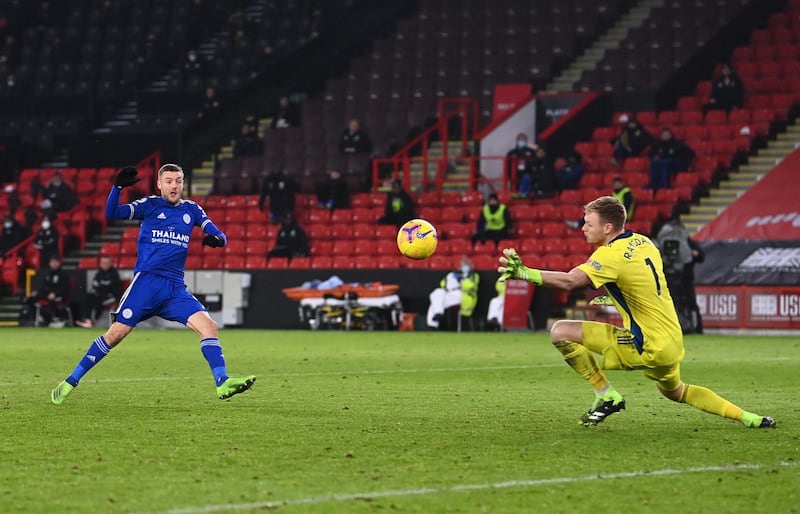 SHEFFIELD, ENGLAND - DECEMBER 06: Jamie Vardy of Leicester City scores their sides second goal past Aaron Ramsdale of Sheffield United during the Premier League match between Sheffield United and Leicester City at Bramall Lane on December 06, 2020 in Sheffield, England. The match will be played without fans, behind closed doors as a Covid-19 precaution. (Photo by Laurence Griffiths/Getty Images)