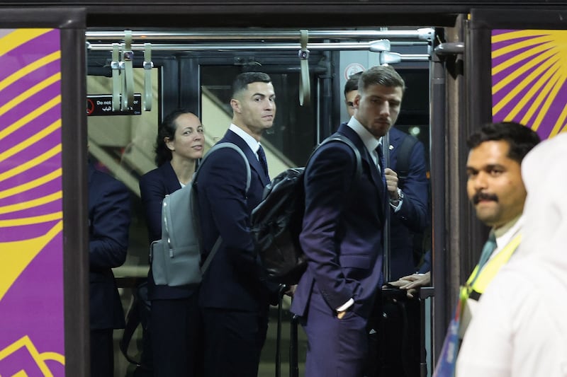 Portugal's players, including Cristiano Ronaldo, after arriving at the Hamad International Airport in Doha. AFP