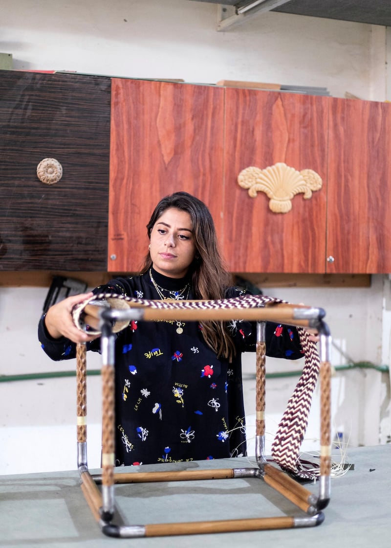 SHARJAH, UNITED ARAB EMIRATES. 7 SEPTEMBER 2019. 

Lana El Samman test a khoos sample on a prototype of her table, which is being produced in Aden Furniture & Wood factory.

Lana El Samman is currently a resident designer in Tashkeel’s Tanween program. The program is open to emerging designers, makers and artisans living and working in the UAE.


Lana El Samman is of Lebanese origin, and grew up in Beirut and later Canada, where she studied interior design followed by a Master’s degree at the Florence Institute of Design, Italy. Her career began as a teaching assistant at the American University of Sharjah before joining Sharjah Art Foundation, which has been her home for the past eight years working as an interior designer and then progressing to become a significant member of the production programme. In the SAF Production Programme, Samman has had the chance to further her furniture design practice and create pieces used by the Foundation for various events.

(Photo: Reem Mohammed/The National)

Reporter: KATE HAZELL
Section: WK