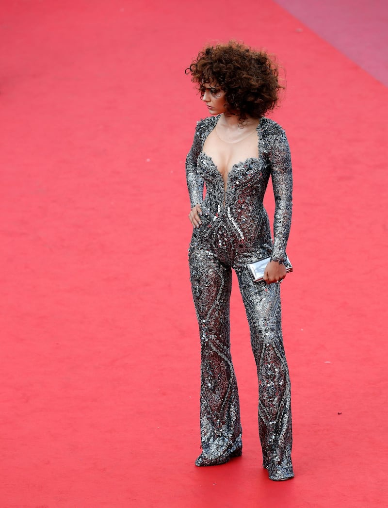 Kangana Ranaut wore a costume-like jumpsuit by Turkish design house Nedo by Nedret Taciroglu - the only thing we're not a fan of here are the little puddles of material collecting at the bottom of the trou' - a quick alteration and that would be fixed, however. EPA