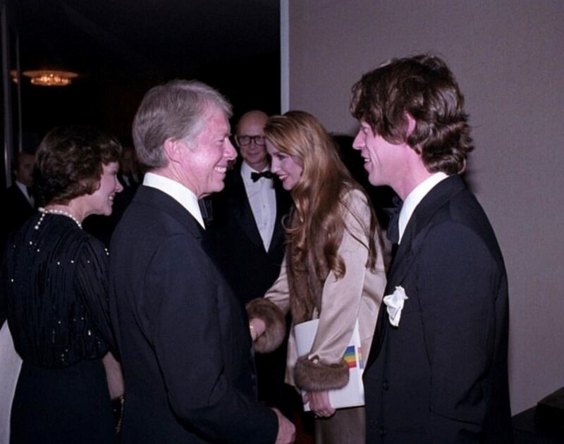 The Carters receive Mick Jagger and his then-wife model Jerry Hall. Photo: Jimmy Carter Presidential Library