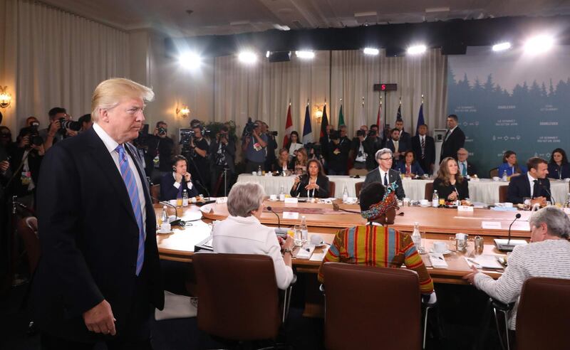 US President Donald Trump arrives late for the Gender Equality Advisory Council breakfast meeting on the second day of the G7 Summit in Quebec. EPA