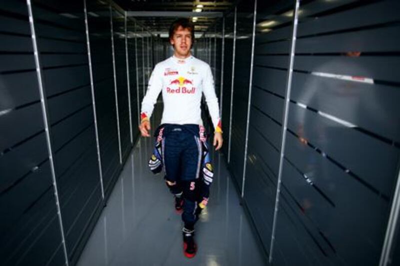 SUZUKA, JAPAN - OCTOBER 08:  Sebastian Vettel of Germany and Red Bull Racing prepares to drive during practice for the Japanese Formula One Grand Prix at Suzuka Circuit on October 8, 2010 in Suzuka, Japan.  (Photo by Mark Thompson/Getty Images)