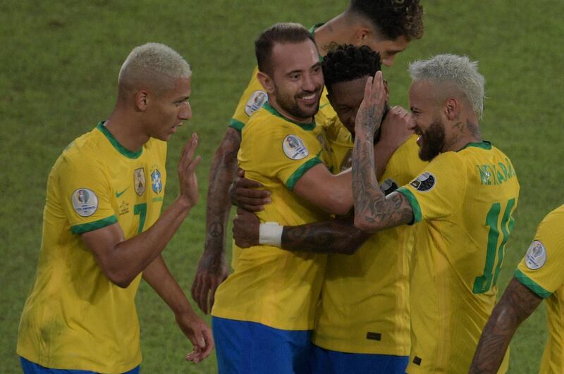 Brazil's Everton Ribeiro celebrates with Richarlison and Neymar. AFP