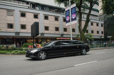 epa06801230 North Korean leader Kim Jong-un leaves the St. Regis Hotel with a motocade to meet with US President Donald J. Trump in Singapore, 12 June 2018. The summit marks the first meeting between an incumbent US President and a North Korean leader.  EPA/TOM WHITE