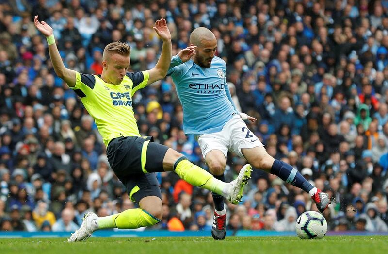 Centre midfield: David Silva (Manchester City) – Besides his usual classy passing, he marked his first appearance of the campaign with a terrific goal from a free kick. Reuters