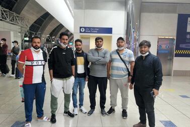 A group of passengers including Harjinder Singh, left, and Deepak Gupta, right, have been stranded at Dubai airport since March 18 due to coronavirus restrictions. Courtesy: Deepak Gupta