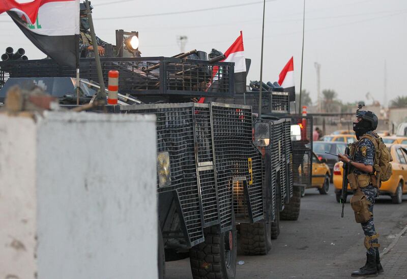 Iraqi police are seen deployed in Baghdad's predominantly Shiite Sadr City. Demonstrations across Baghdad and the south have spiralled into violence over the last week, with witnesses reporting security forces using water cannons, tear gas and live rounds and authorities saying "unidentified snipers" have shot at protesters and police. On Sunday evening a mass protest in Sadr City in east Baghdad led to clashes that medics and security forces said left 13 people dead. AFP