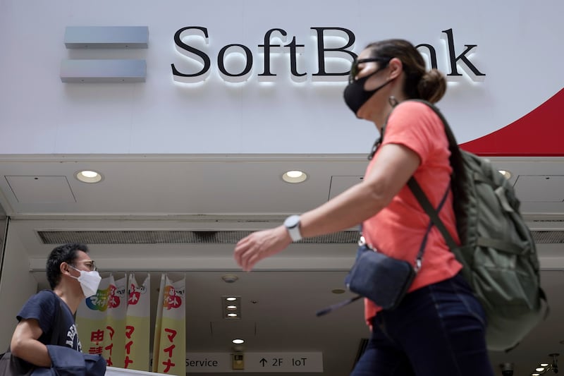 SoftBank Group reported reported a on Monday as the value of its investments declined amid a slump in global technology stocks. AP