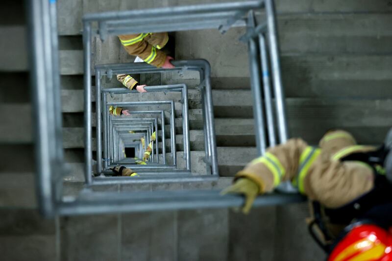 Firefighters and emergency personnel during the firefighter stair climb in Melbourne, Australia. Firefighters and emergency personnel climb 28 flights of stairs wearing 25 kilograms of gear to raise money for mental health. EPA