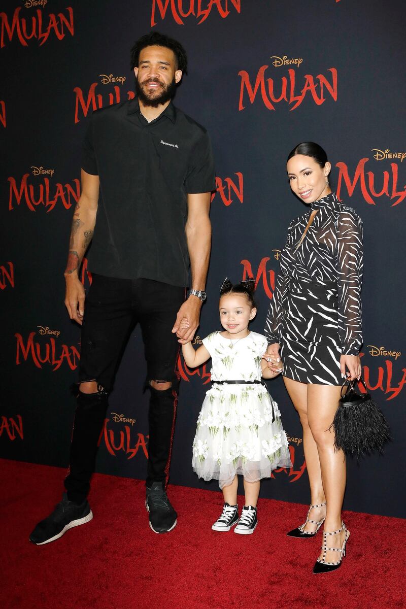 JaVale McGee arrives with his family for the world premiere of 'Mulan'. EPA