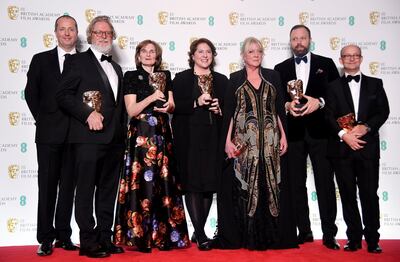 Andrew Lowe, Tony McNamara, Deborah Davis, Lee Magiday, Ceci Dempsey, Yorgos Lanthimos and Ed Guiney hold their awards for Outstanding British Film 'The Favourite' at the British Academy of Film and Television Awards (BAFTA) at the Royal Albert Hall in London, Britain, February 10, 2019. REUTERS/Toby Melville