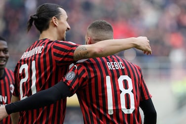 Zlatan Ibrahimovic, left, celebrates with Ante Rebic during AC Milan's win over Udinese. AP Photo