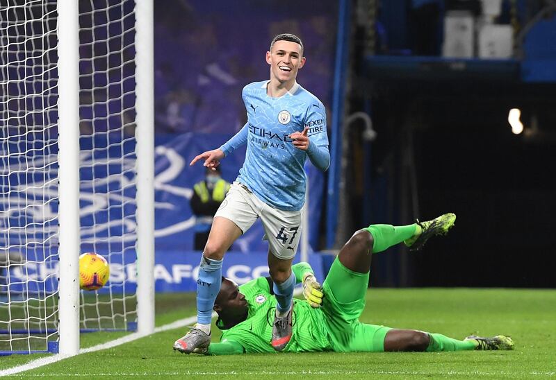 File photo dated 3-01-2021 of Manchester City's Phil Foden celebrates scoring his side's second goal of the game. Issue date: Tuesday May 11, 2021. PA Photo. Manchester City have clinched their third Premier League title in four years, PA news agency looks at five games crucial to their success. Chelsea, won 3-1, Stamford Bridge. See PA Story SOCCER Man City Games. Photo credit should read: Andy Rain/PA Wire