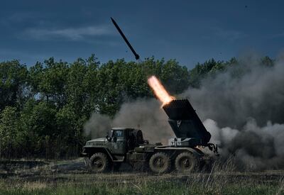 A Ukrainian army Grad multiple rocket launcher fires rockets at Russian positions on the front line near Bakhmut on Wednesday. AP