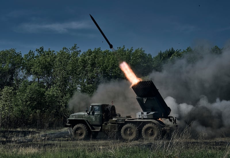 A Ukrainian army multiple rocket launcher fires at Russian positions on the front line near Bakhmut. AP