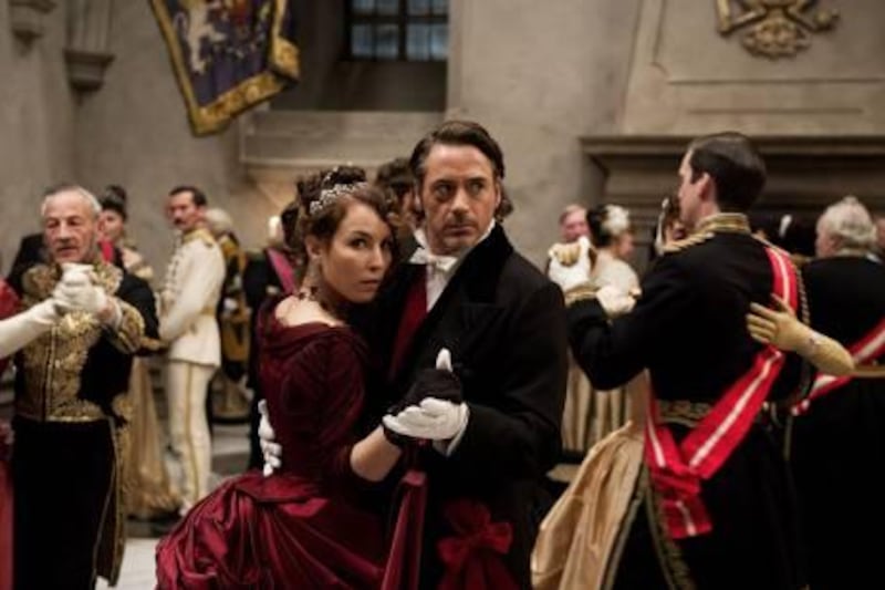 NOOMI RAPACE as Madam Simza Heron and ROBERT DOWNEY JR. as Sherlock Holmes in Warner Bros. PicturesÕ and Village Roadshow PicturesÕ action adventure mystery ÒSHERLOCK HOLMES: A GAME OF SHADOWS,Ó a Warner Bros. Pictures release.

Courtesy Warner Bros