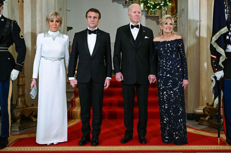 US President Joe Biden and first lady Jill Biden welcome French President Emmanuel Macron and wife Brigitte to the White House for a state dinner on December 1. AFP