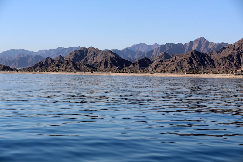 The mountains can be seen from the Gulf of Oman in Dibba, Fujairah. Chris Whiteoak / The National